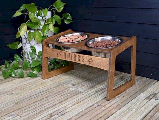 Elegant wooden elevated dog feeder with metal accents